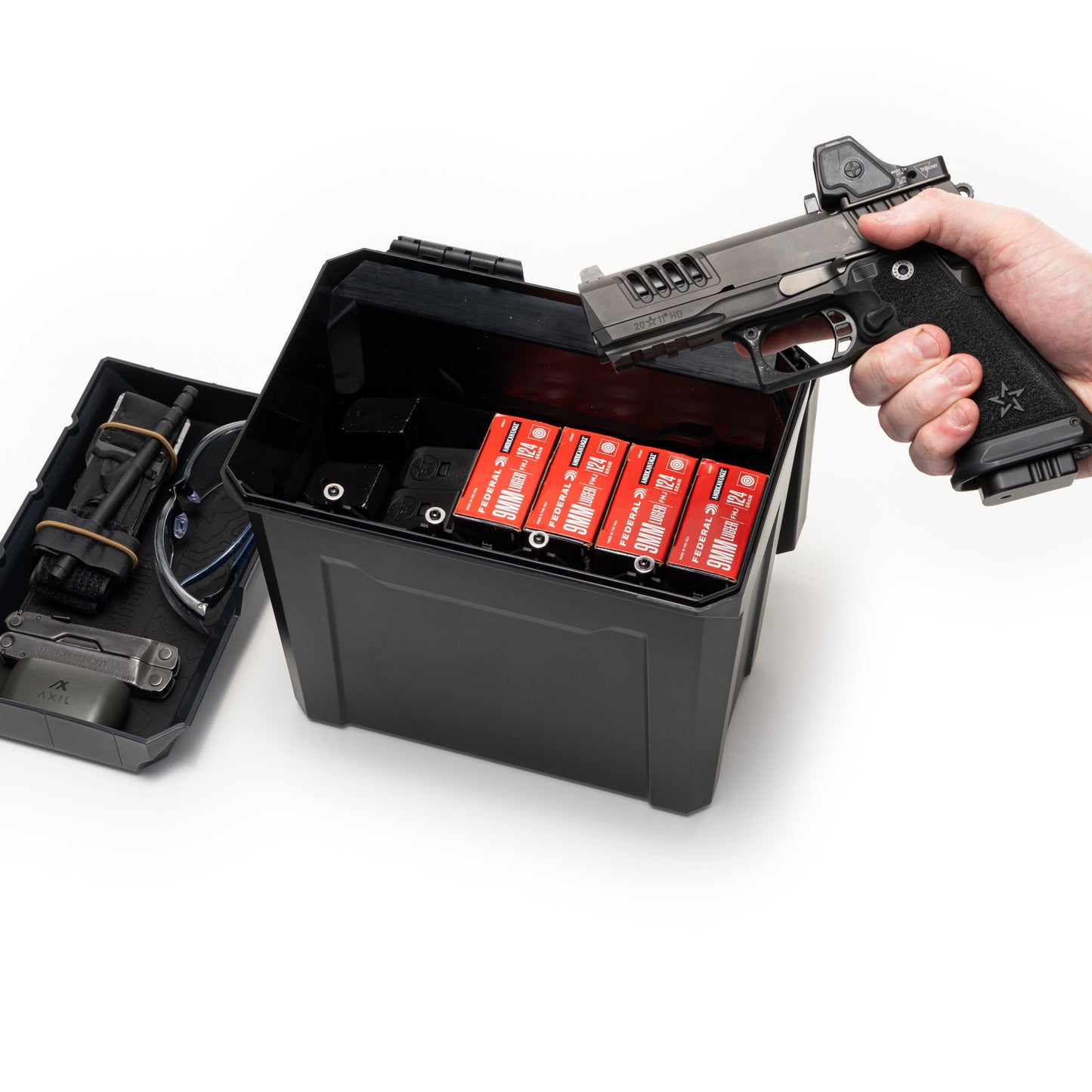 Open UCAN utility storage box with mechanical code lock used to organize ammo and shooting accessories