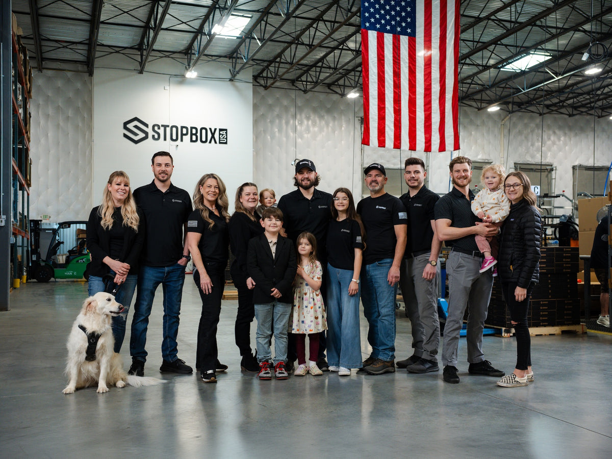 Dylan Ervin and family at the StopBox warehouse in Spokane