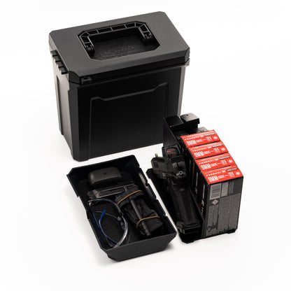 UCAN utility storage box with mechanical locking system organizing range gear and everyday carry items on table