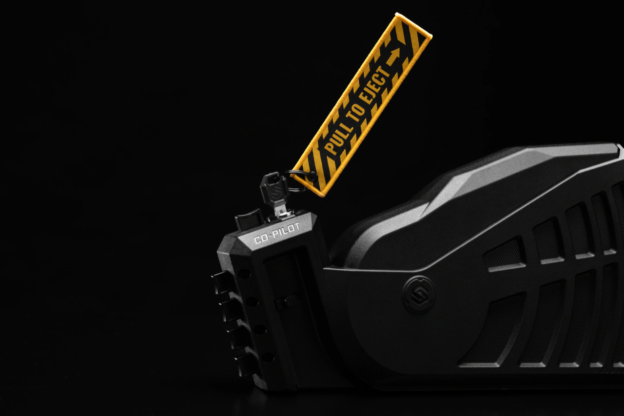 Co-Pilot key lock with the yellow Pull To Eject lanyard attached to the key